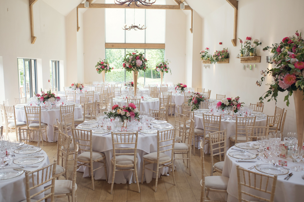 Tall-and-low-centrepieces-at-Millbridge-Court Tall-and-low-centrepieces-at-Millbridge-Court